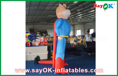 Vache gonflable bleue/rouge à Superman a adapté le modèle aux besoins du client gonflable de caractère animal