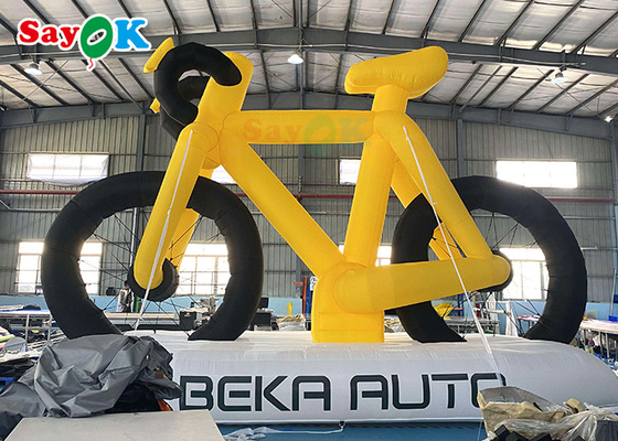 Bicyclette promotionnelle de modèle de produits gonflables faits sur commande élevés de la publicité jaune avec la copie