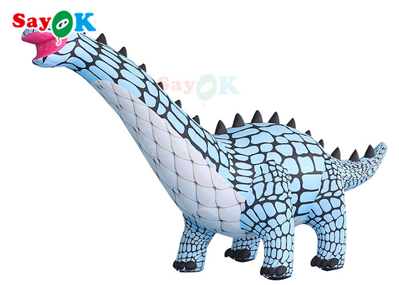 Un modèle de dinosaure géant attrayant et vert gonflable