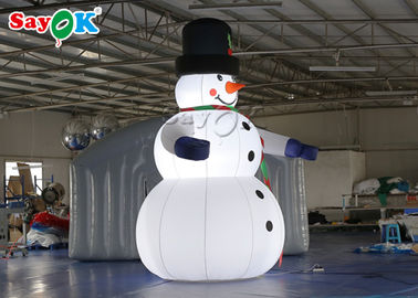 Décorations gonflables de vacances de tissu d'Oxfor portant le bonhomme de neige de Noël de chapeau noir et d'explosion de mitaines