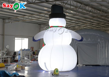 Décorations gonflables de vacances de tissu d'Oxfor portant le bonhomme de neige de Noël de chapeau noir et d'explosion de mitaines