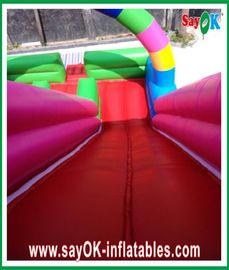 Grands toboggans gonflables à thème clown gonflables toboggan multi-couleurs pour parc d'attractions