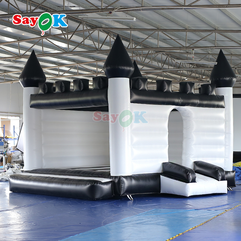 Château gonflable Sayok blanc et noir, maison gonflable gonflable pour événements en plein air