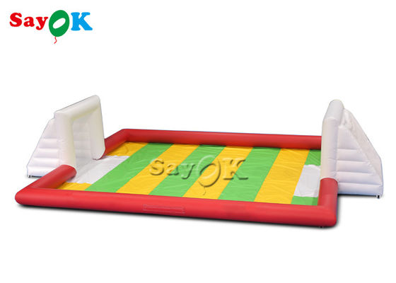 Terrain de football gonflable rouge gonflable d'explosion de carnaval de jeux de sports de PVC des jeux de partie 10x7m