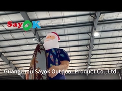 Le modèle de décoration de Noël hawaïen Noël gonflable le Père Noël sur la plage