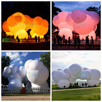 Grande tente gonflable en forme de nuage de 12m x 7m avec éclairage LED et logo personnalisable pour événements extérieurs