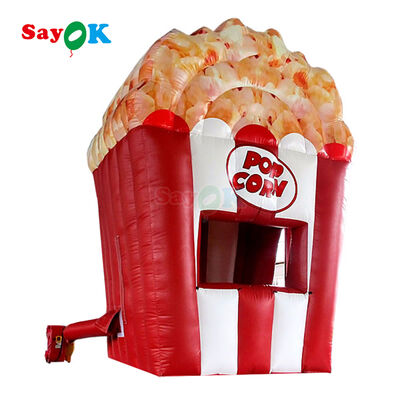 Stand de pop-corn gonflable portable personnalisé avec tente à air, bâche en PVC durable de 0,4 mm et résistance aux UV pour événements en extérieur