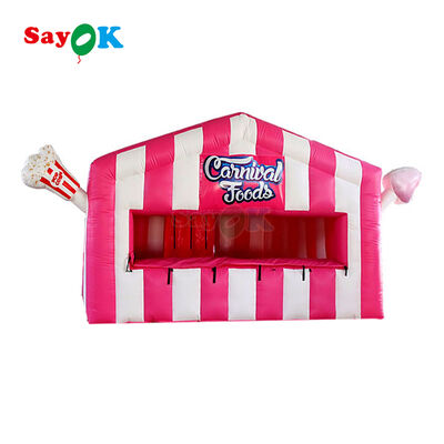 Stand de pop-corn gonflable portable personnalisé avec tente à air, bâche en PVC durable de 0,4 mm et résistance aux UV pour événements en extérieur