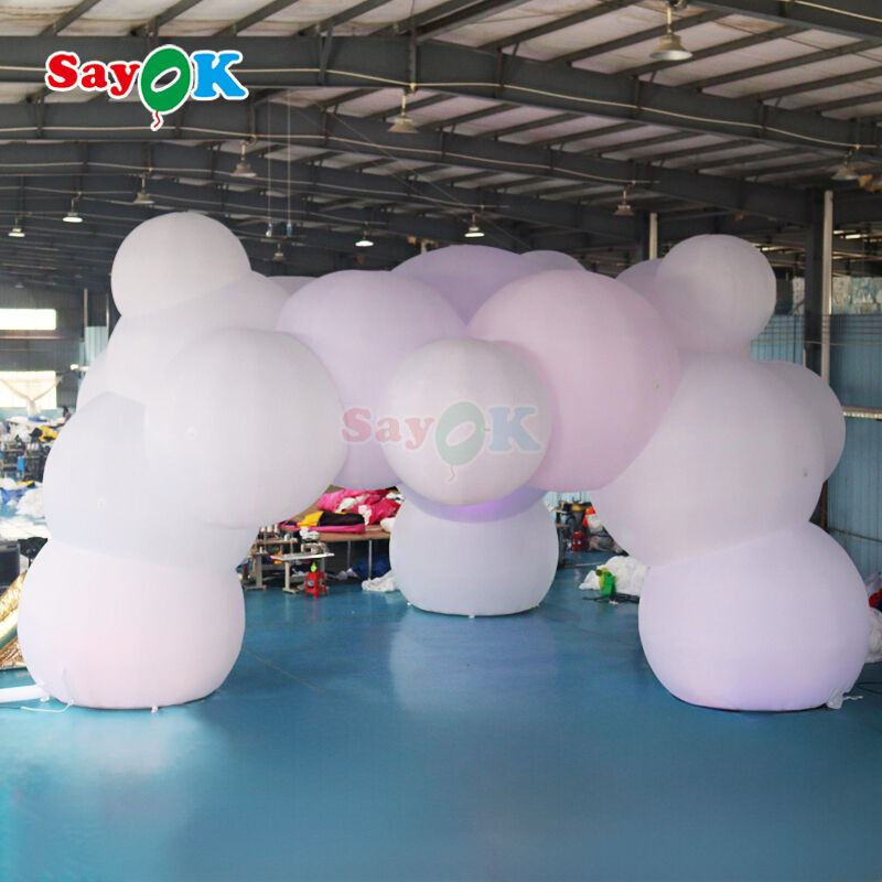 Grande tente gonflable en forme de nuage de 12m x 7m avec éclairage LED et logo personnalisable pour événements extérieurs